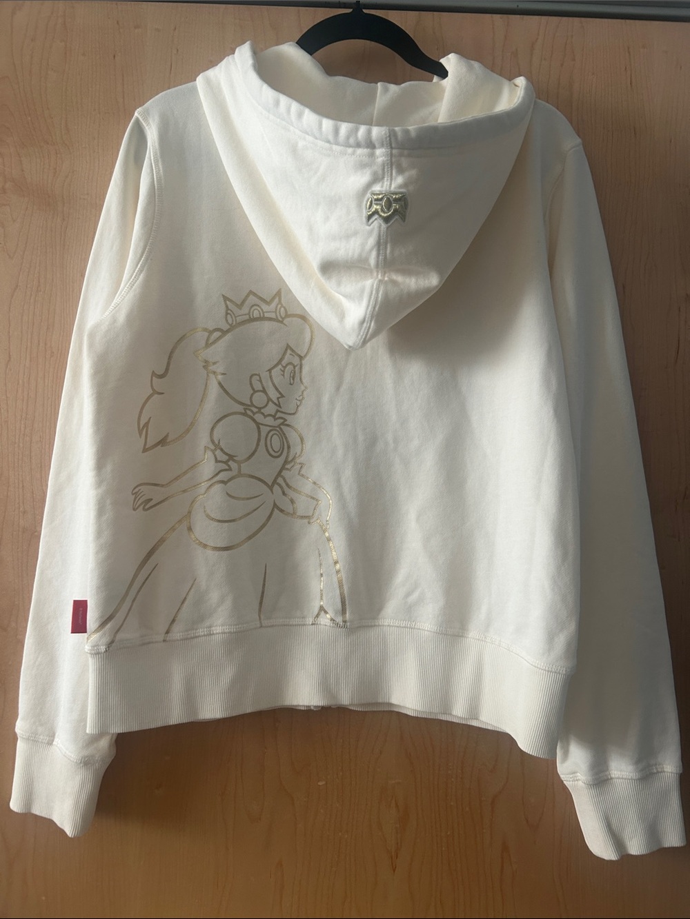 Nintendo Cream Hoodie with Gold Princess Peach Outline